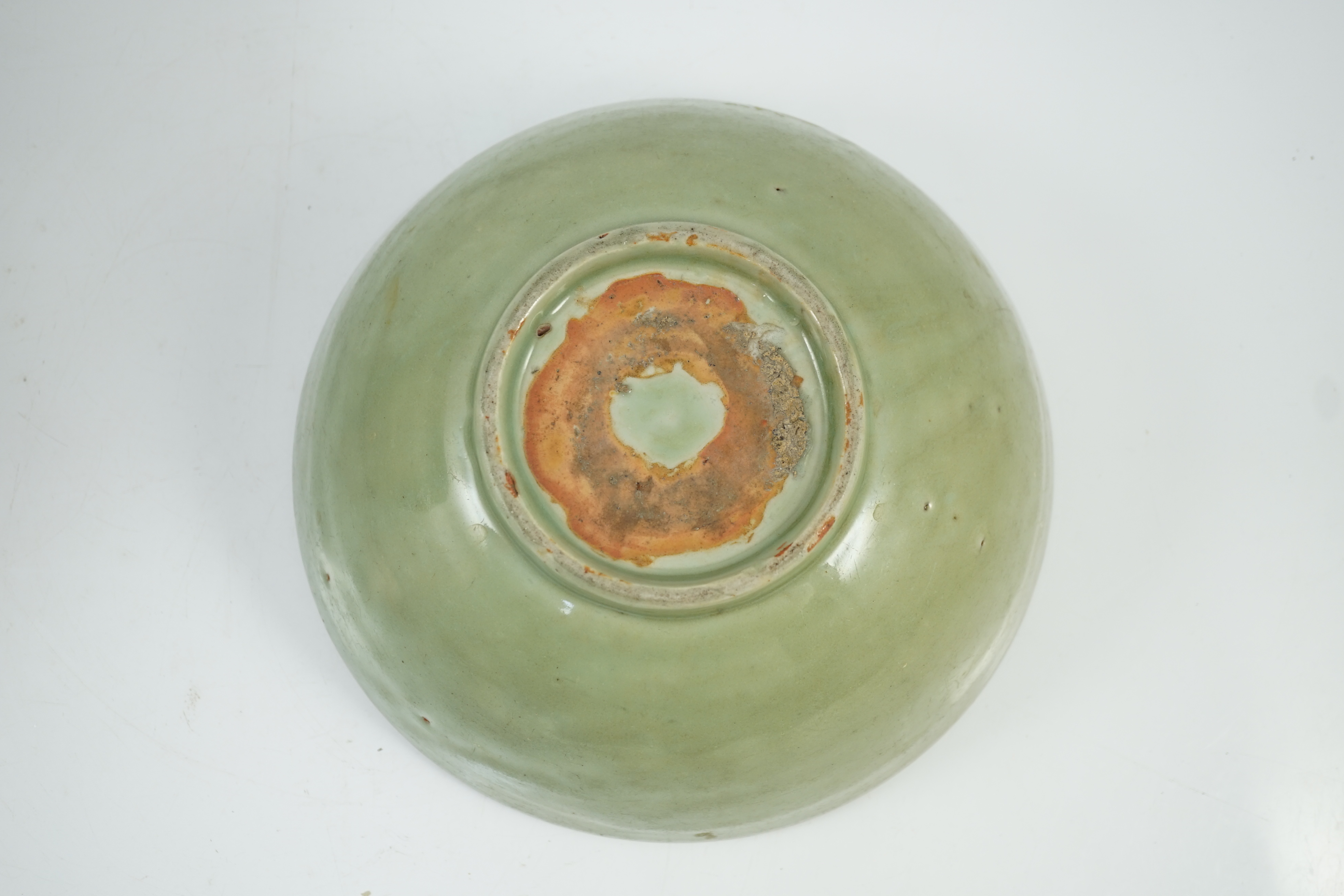 A Chinese Ming Longquan celadon bowl, 15th century, glaze scratched